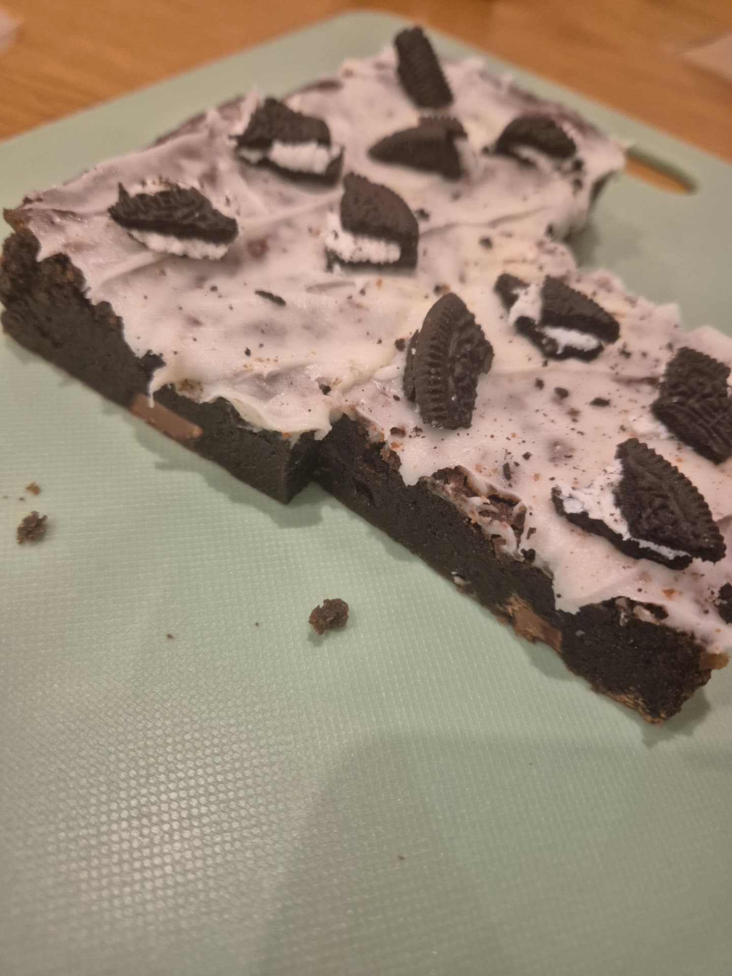 Our Oreo brownie slab topped with vanilla icing and Oreo pieces
